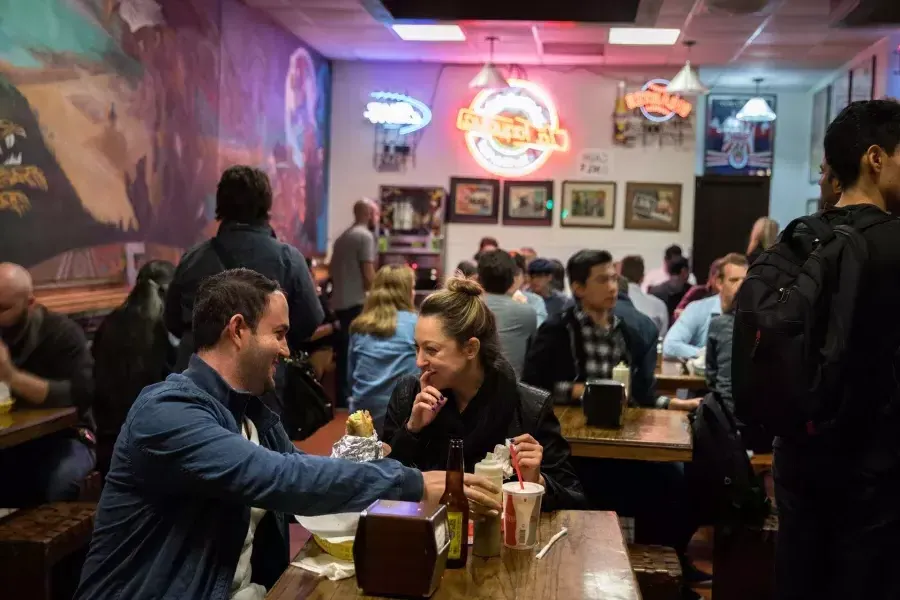 Visitors enjoy authentic Mexican food in San Francisco's Mission neighborhood.